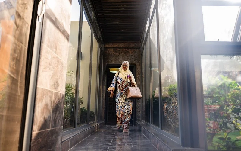 Prof. Dr. Hadiza Shehu Galadanci exits her home before setting off for work at the African Center of Excellence for Population Health and Policy (ACEPHAP), Aminu Kano Teaching Hospital, in Kano, Kano State, Nigeria on January 19, 2026.